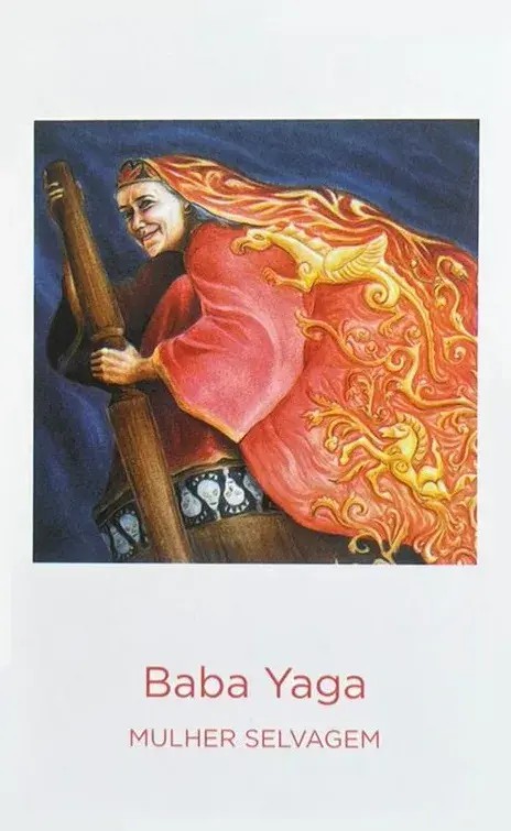a deusa baba yaga segurando uma vassoura de madeira e com um vestido vermelho