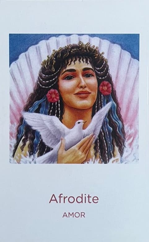 Carta de tarot da Afrodite que mostra a imagem de uma mulher com uma pomba branca na m�o e cabelos pretos
