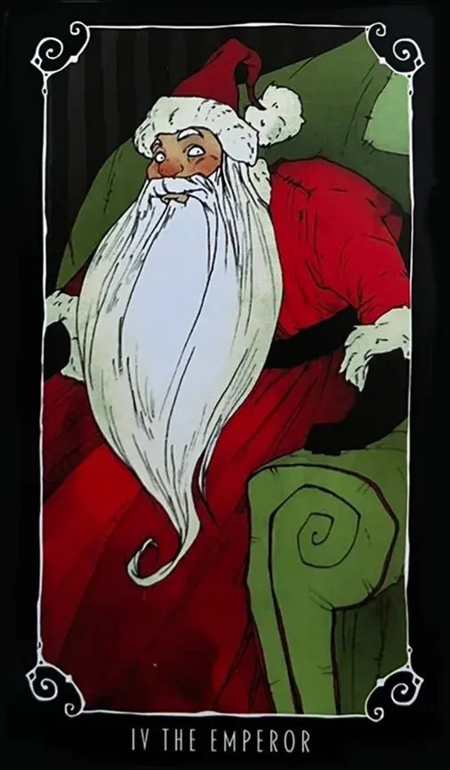 um papai noel sentado em uma poltrona verde