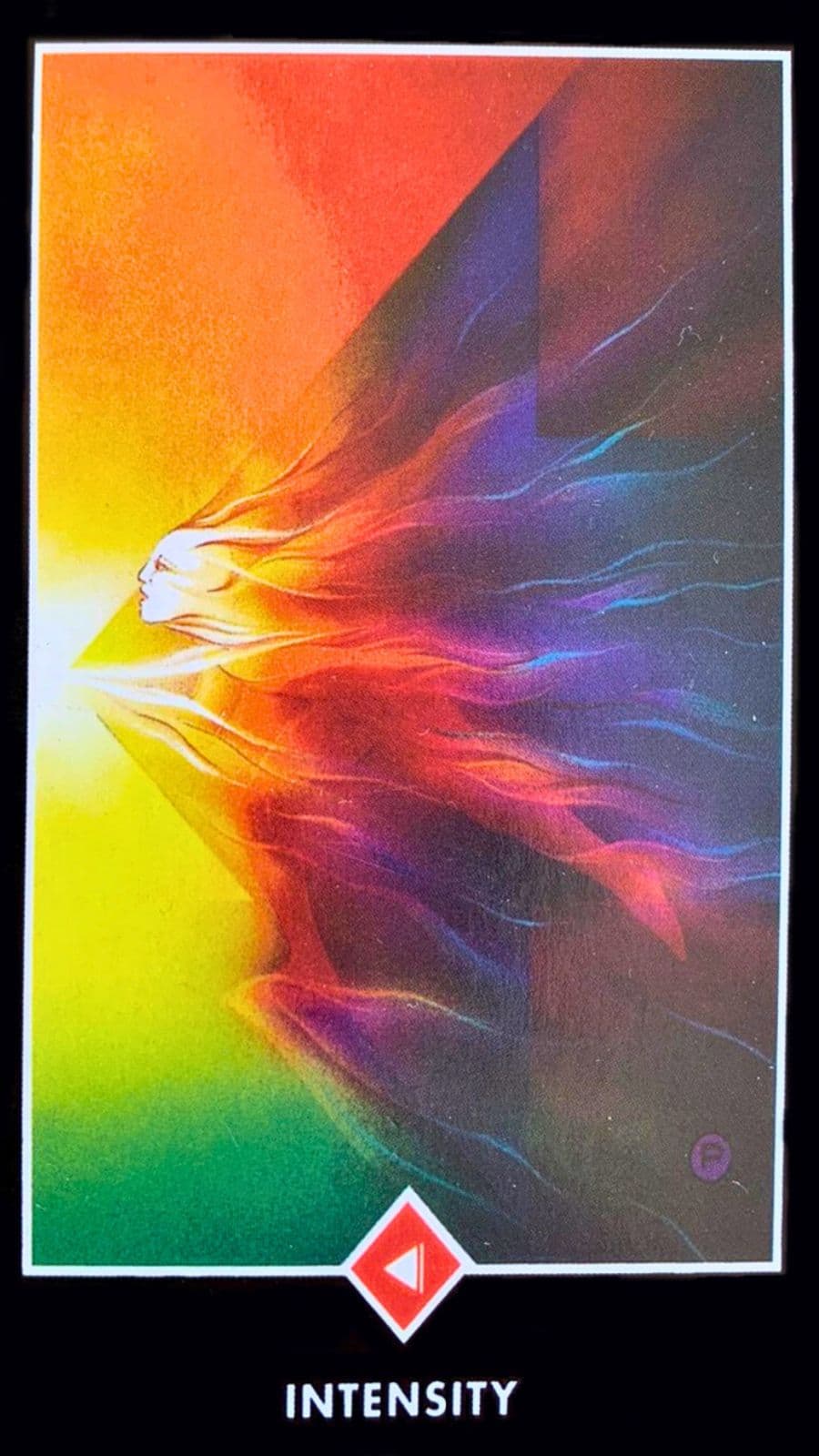 tarot do taro zen osho intensidade em uma mesa com outras cartas viradas para baixo