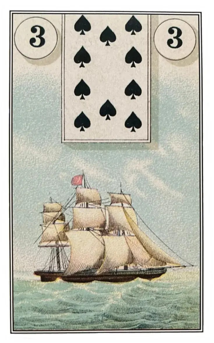 Carta do baralho cigano que mostra a imagem de um navio antigo em um oceano