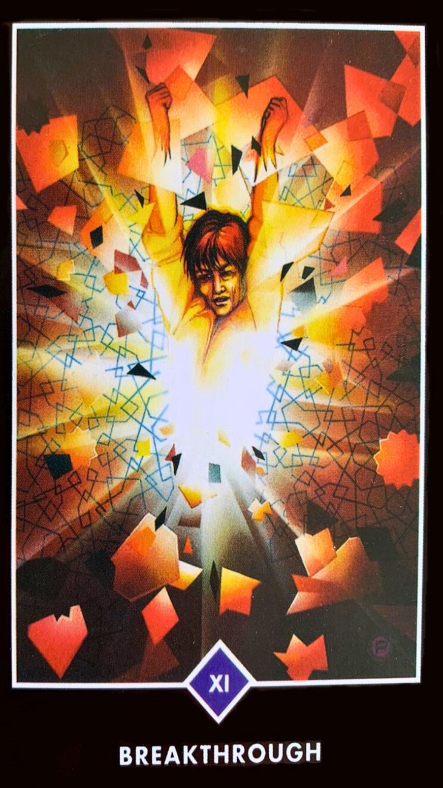 A cor vermelha � dominante na carta a imagem central da carta mostra peda�os estilha�ados, dando a real impress�o de que h� uma quebra efetiva Ao redor da figura humana retratada na carta, h� uma aura brilhante e poderosa.
