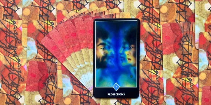 carta do tarot do osho onde mostra a imagem de um rosto de um homem olhando para o rosto de uma mulher que tamb�m olha para ele