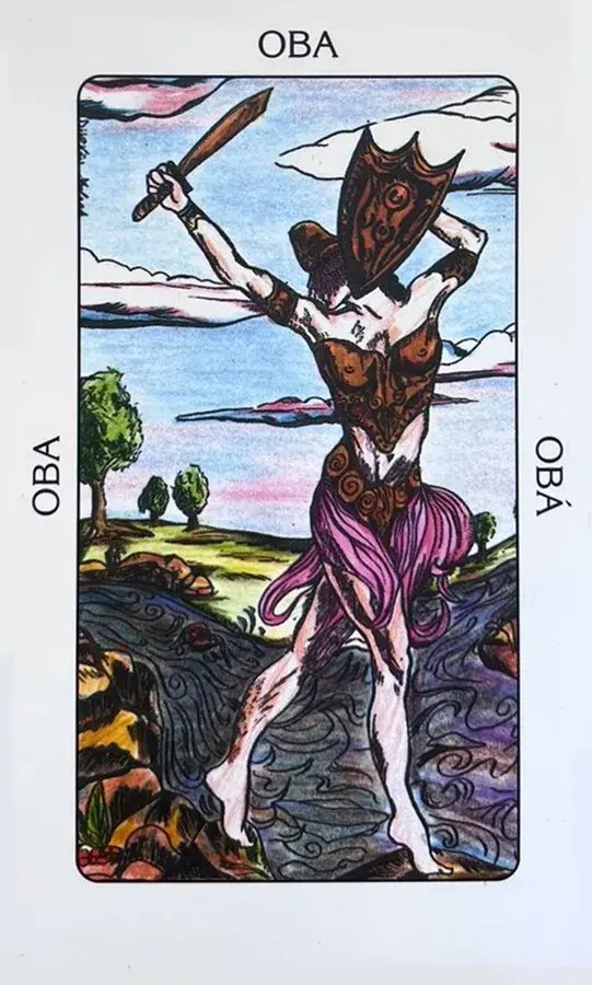 Uma figura de dan�arina, pequena, estilizada, quase et�rea; caminha sobre as rochas e �guas, dando a sensa��o de que ouve ao longe uma musica marcial, com ritmo r�pidos e marcados. Em uma m�o segura uma pequena espada parecida com uma faca do mato, e, na outra, um escudo que cobre parte de sua cabe�a. Toda a sua vestimenta nos faz lembrar uma armadura, prevalecendo as cores de a�o e rosa. Ela foi a patrona do rio do mesmo nome na �frica, e a primeira esposa de Xang�, fiel companheira e muito ciumenta de seu marido.