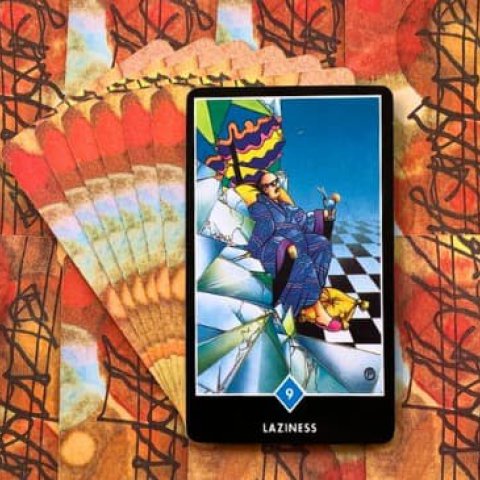 Tarot Zen Osho - Pregui�a (9 de Copas): Significado e interpreta��o da carta - Or�culos Web